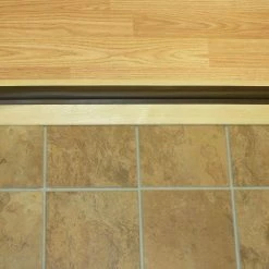 M-D Building Products High 3-1/2 in. x 23-1/2 in. Unfinished Hardwood Threshold with Flexible Vinyl Seal -Deals Hillman Store tan m d building products thresholds 99039023500 44 1000